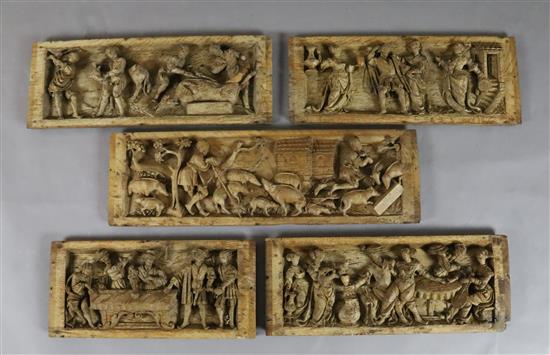 A set of five 16th century Flemish relief carved oak panels, largest 8.25 x 27in.